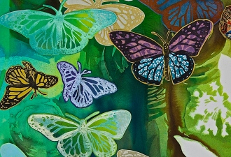 close-up of block print butterflies, chine colle, and watercolor