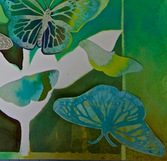 close-up of block print butterflies and watercolor